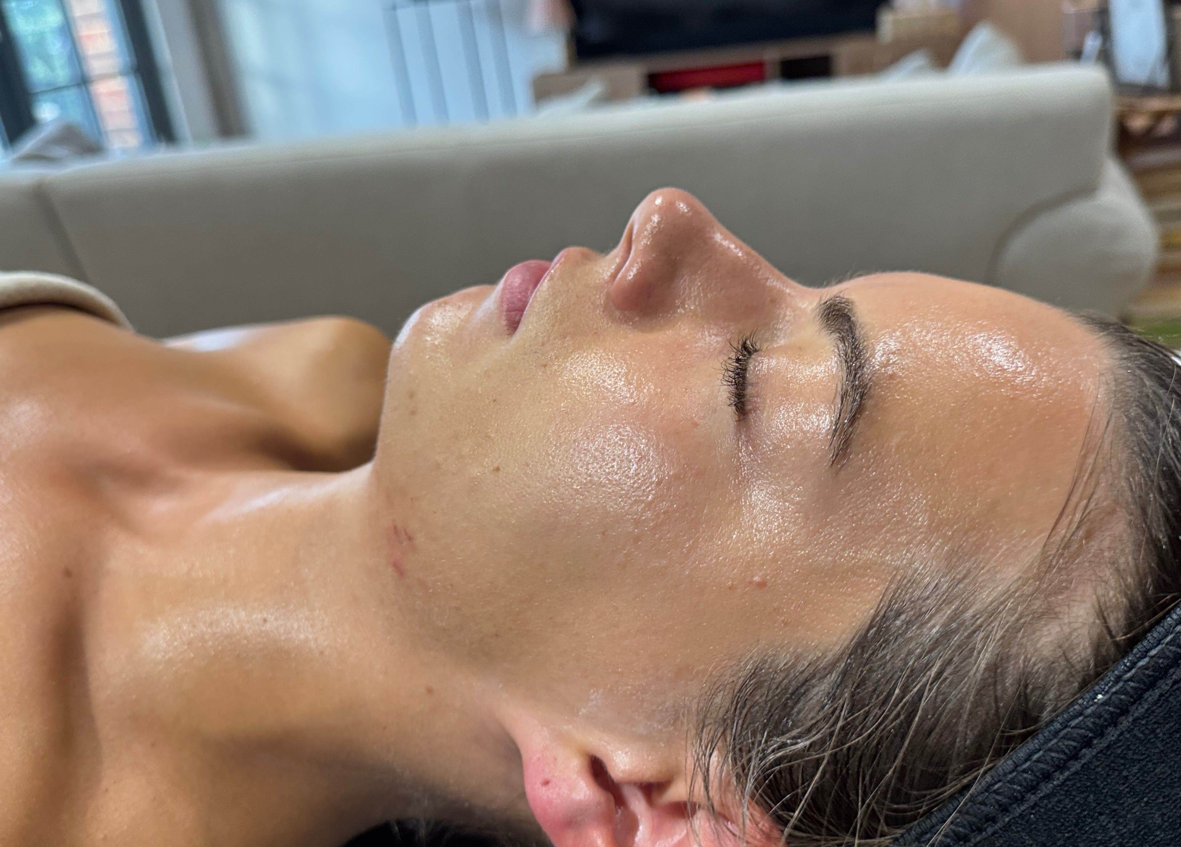 Relaxing facial treatment at Glo! SoS Face and Body Treatments, London, England, GB, enhancing skin radiance.