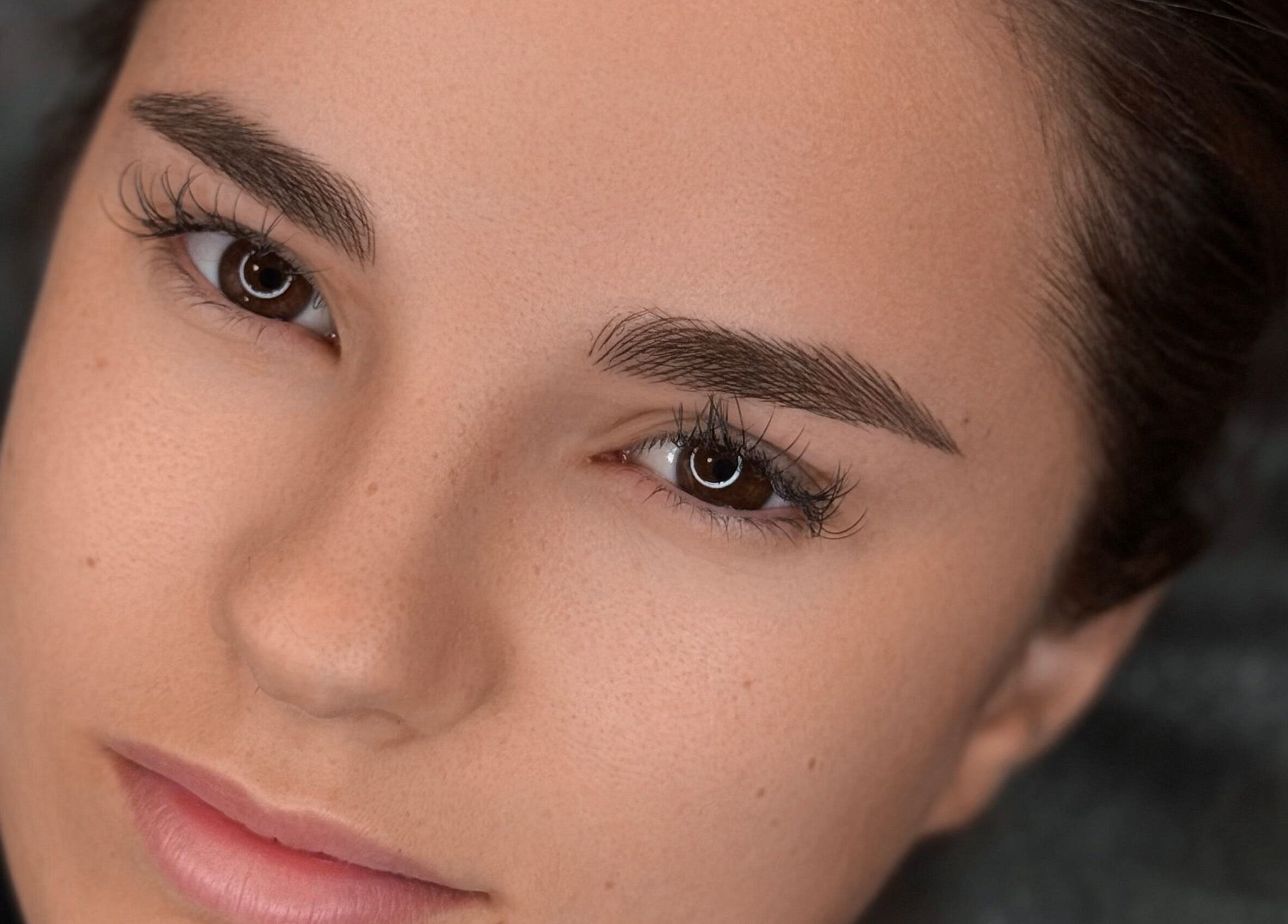 Woman with flawless skin at Beyond by Jeana Chaparo, Worcester, England, GB.