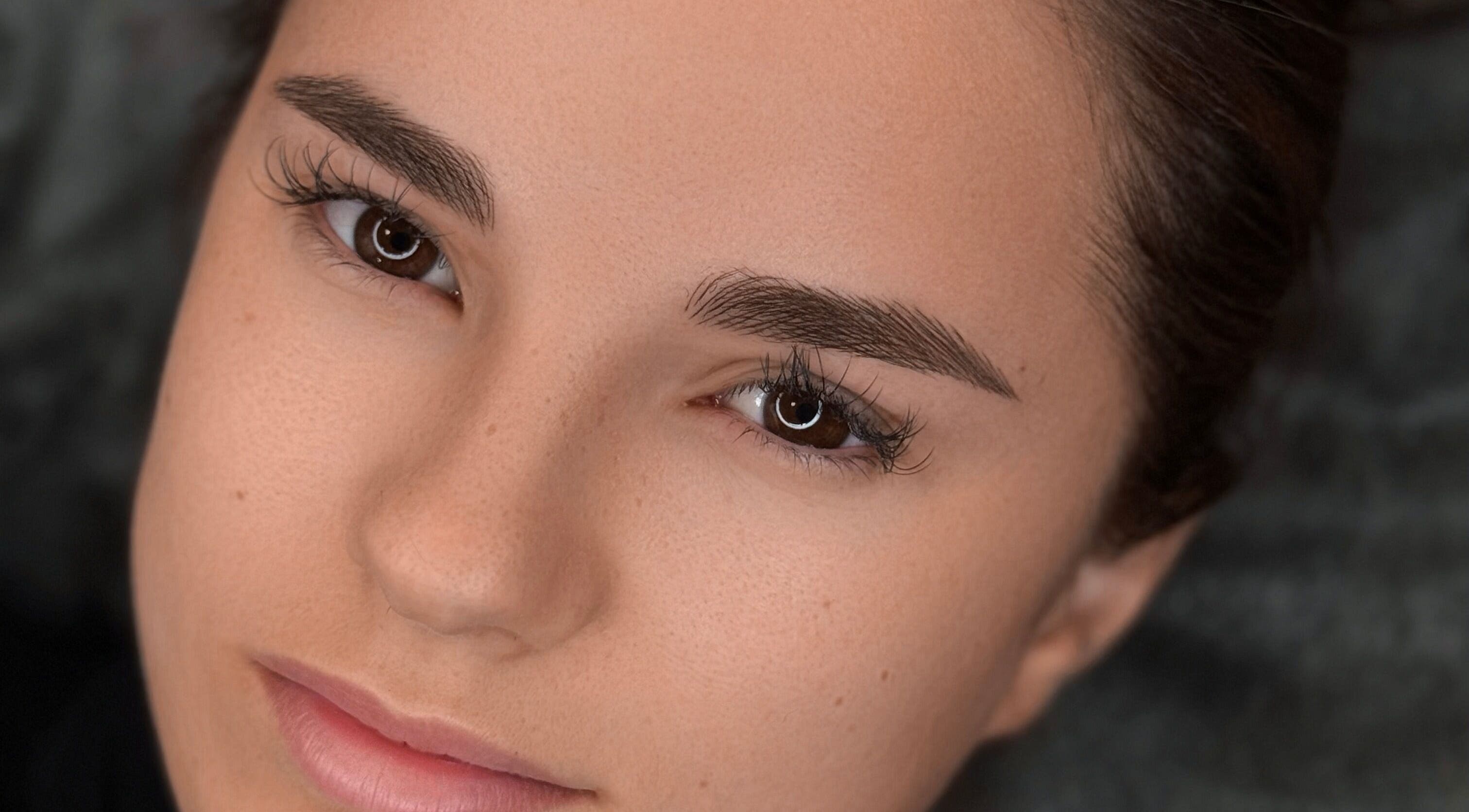 Woman with flawless skin at Beyond by Jeana Chaparo, Worcester, England, GB.