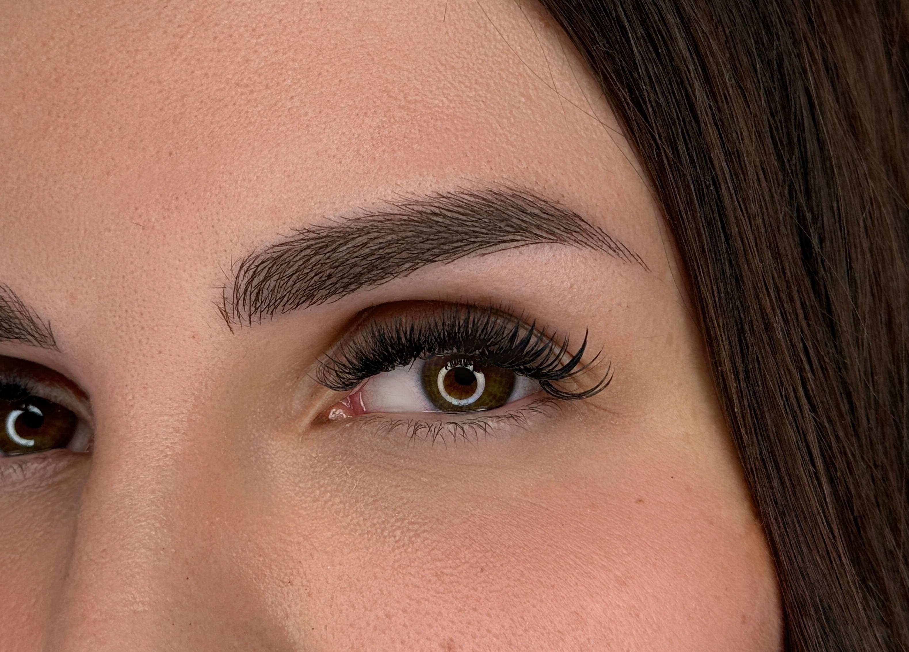 Close-up of expertly styled eyebrows and lashes at Beyond by Jeana Chaparo, Worcester, England, GB.