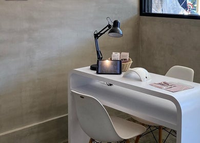 Nail treatment station at Moonlash Studio Tukad Barito, Bali, Bali, ID with modern white desk and tools.