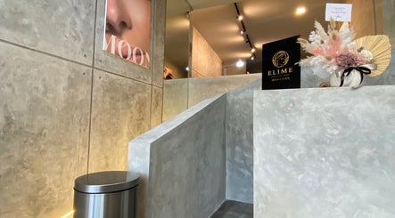 Modern concrete interior of Moonlash Studio in Bali, Bali, ID, showcasing minimalist design and decor.