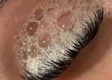 Close-up of lashes with soap bubbles at Moonlash Studio, Bali, Bali, ID. Enhance your beauty naturally.