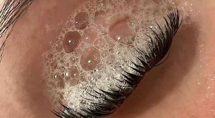 Close-up of lashes with soap bubbles at Moonlash Studio, Bali, Bali, ID. Enhance your beauty naturally.