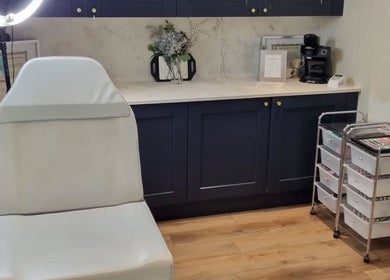 Modern treatment room at Cambridge Permanent MakeUp, Warboys, England, GB featuring sleek decor and equipment.
