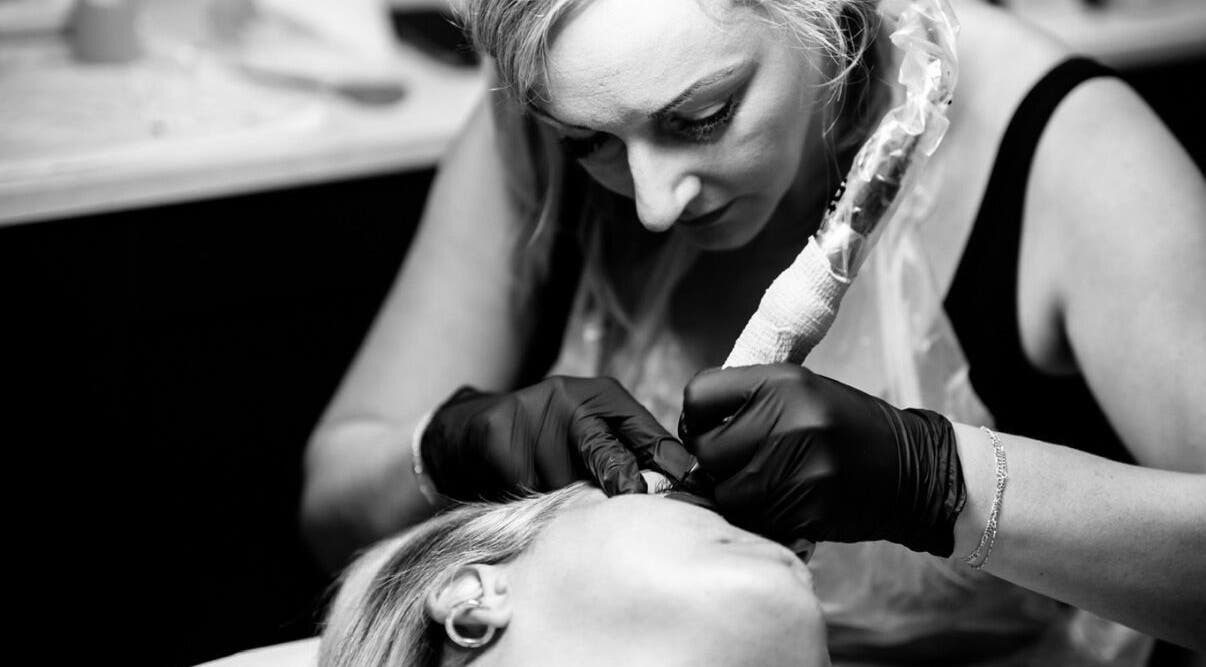 Cambridge Permanent MakeUp artist creating precise eyebrow detail in Warboys, England, GB.