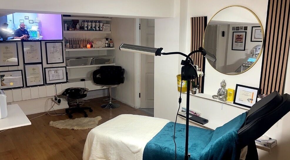 Stylish treatment room at Rich Aesthetic Beauty Clinic in London, England, GB showcasing a serene spa ambiance.