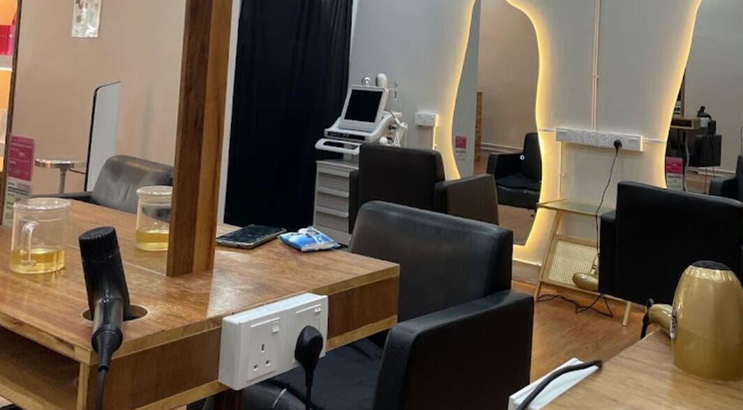 Modern styling station at Elements Hair Salon in Cheras, Selangor, MY featuring chic decor and equipment.