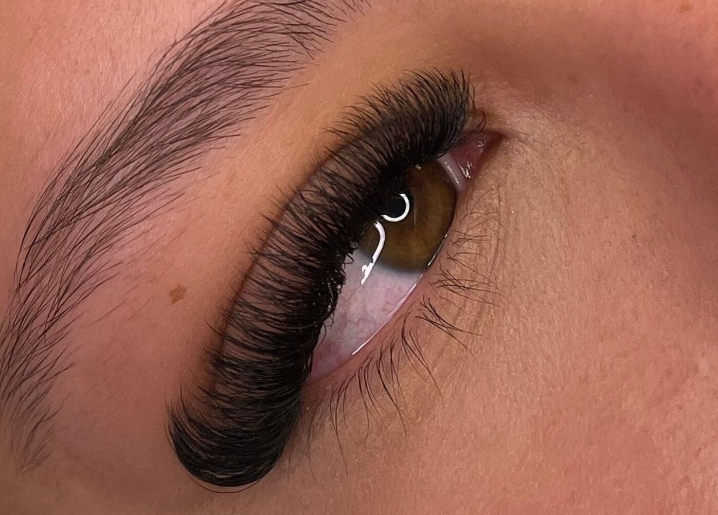 Close-up of enhanced eyelashes from The Glow Lounge By Ebony Louise, Brighton And Hove, England, GB.