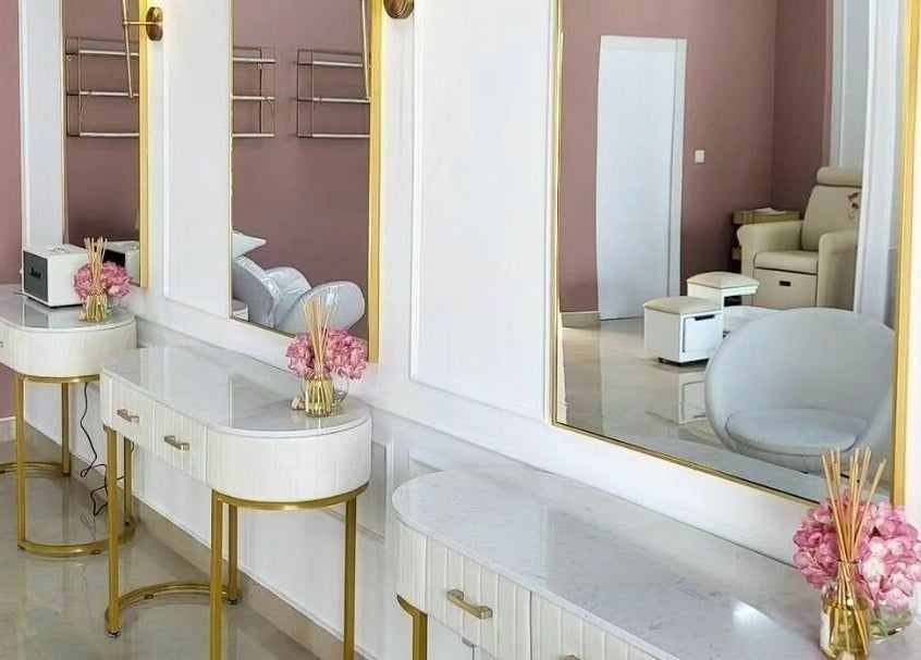 Chic salon stations with mirrors at The Retreat, Dubai, Dubai, AE, showcasing a modern wellness design.