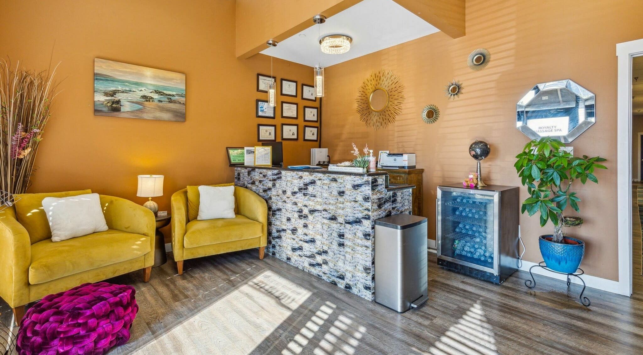 Elegant reception at Royalty Massage Spa in Irving, Texas, US with stylish decor and warm lighting.