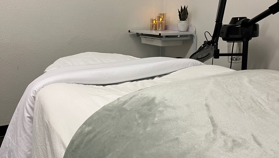 Cozy massage bed at Bridget Wilson Esthetics Studio in Sault Ste. Marie, Ontario, CA, inviting relaxation.