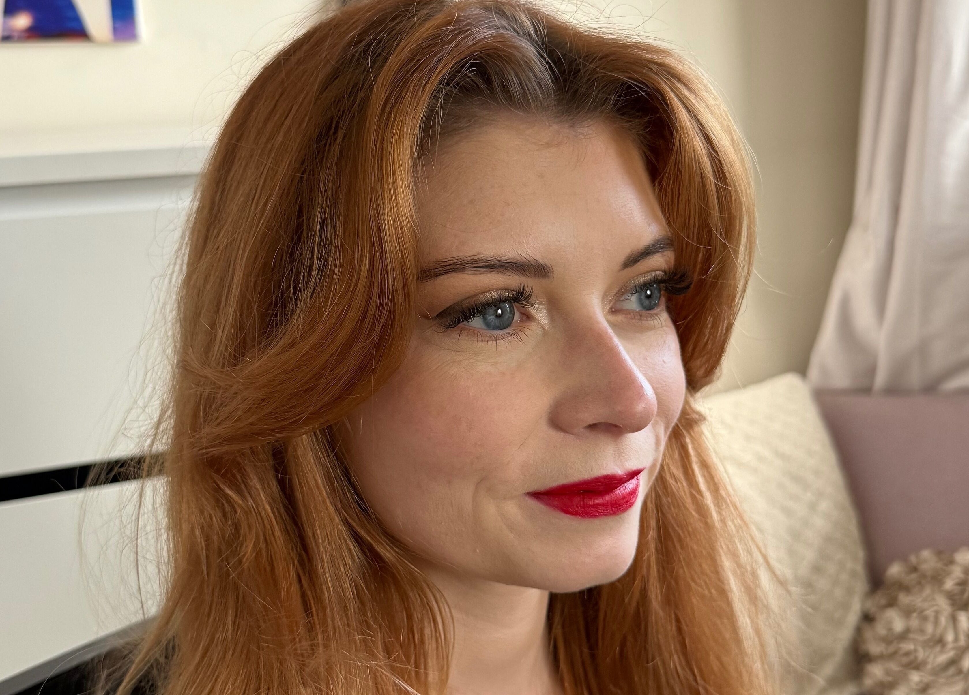 Woman with red hair and makeup by Makeup by Chloe in Monkton Heathfield, England, GB.