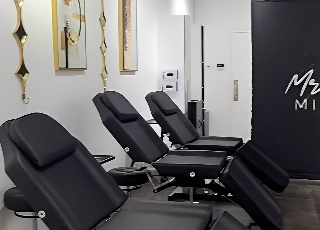 Sleek, modern interior of Mr.Inkwells Piercing Studio MV in Mission Viejo, California, US, featuring ergonomic chairs.