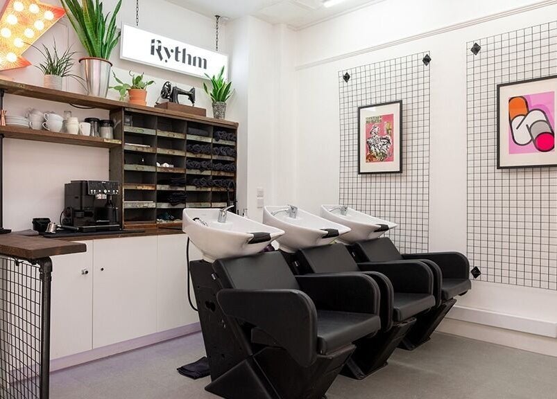 Modern hair washing stations inside Rythm Studio, stylishly decorated in Bristol, England, GB.
