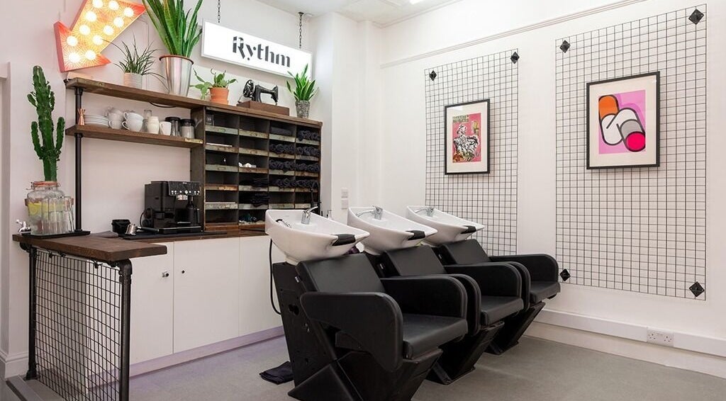 Modern hair washing stations inside Rythm Studio, stylishly decorated in Bristol, England, GB.