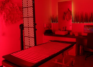 Recovery Space in Dubai, Dubai, AE featuring a calming room with infrared therapy lighting.