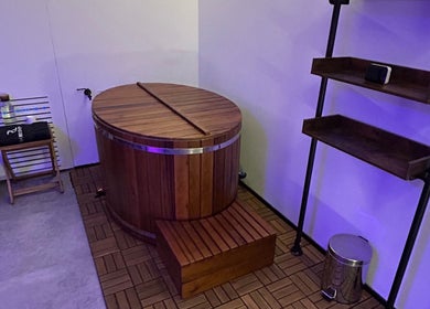 Elegant wooden tub at Recovery Space, Dubai, Dubai, AE, designed for relaxation and wellness.