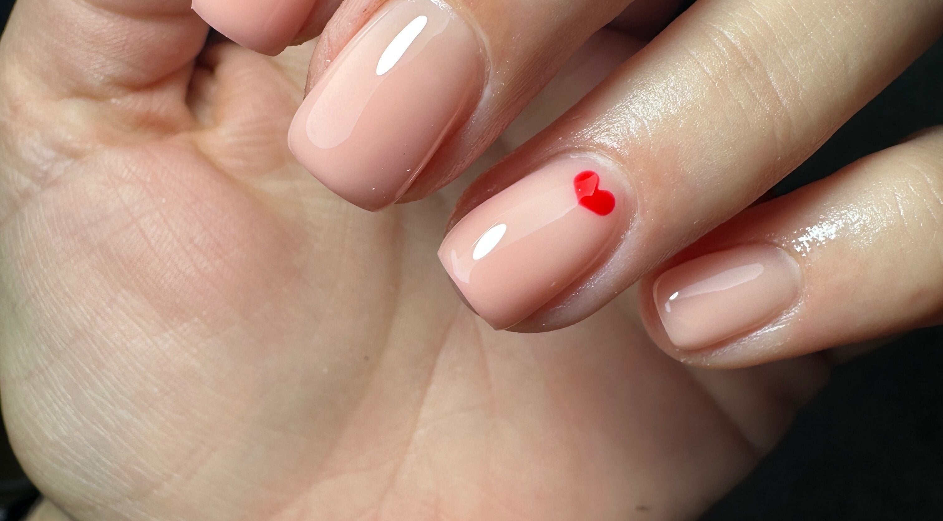 Elegant nail design with heart detail at Sage Beauty & Aesthetics, Wigan, England, GB.