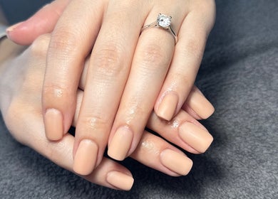 Manicured hands with nude polish at Sage beauty & aesthetics (former JJ Beauty), Wigan, England, GB.