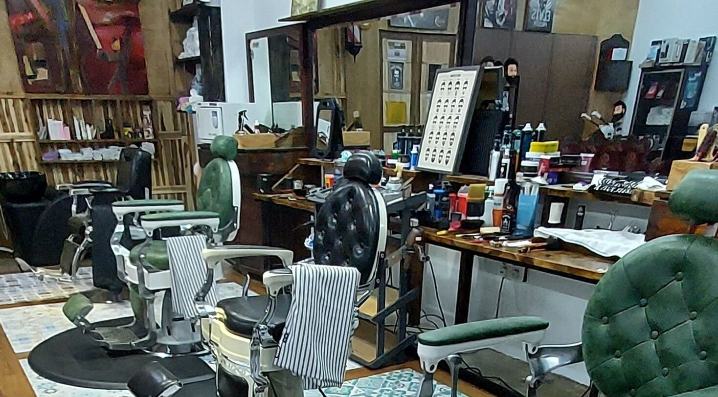 Elegant interior of Sohibussaif Barbershop in Subang Jaya, Selangor, MY, featuring stylish barber chairs.