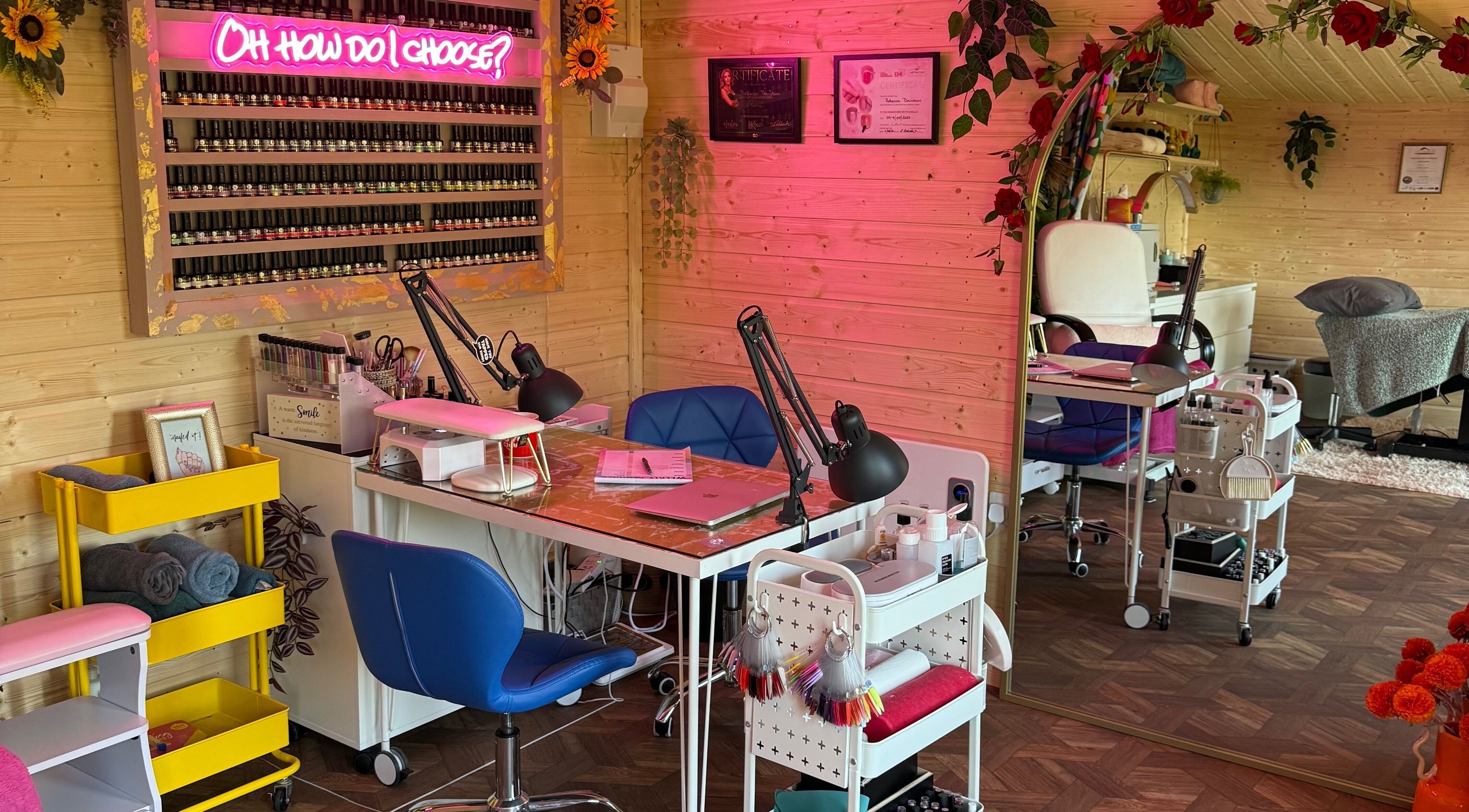 Bright nail salon at The Nest, Larne, Northern Ireland, GB, featuring vibrant decor and modern nail stations.