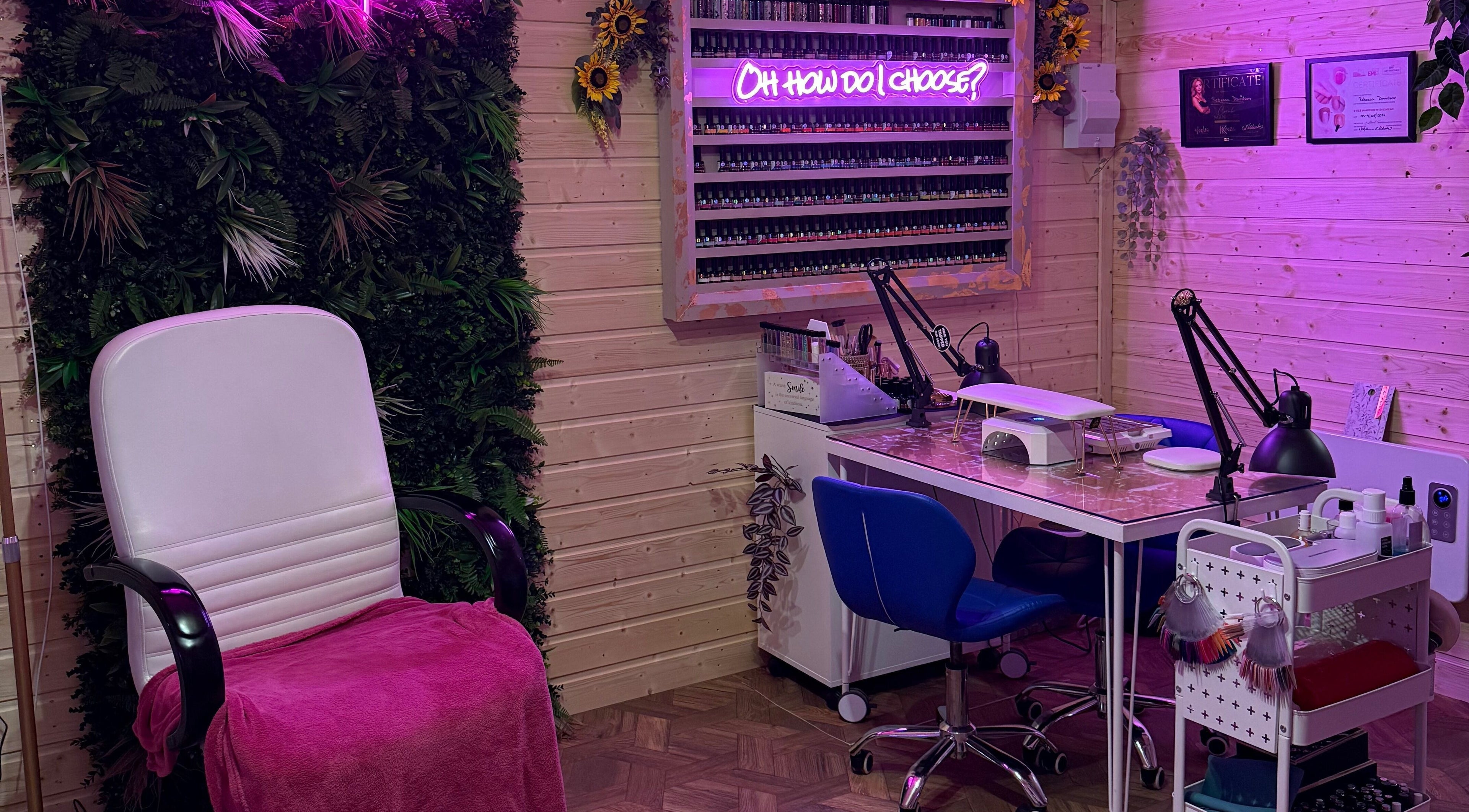 The Nest's vibrant nail studio in Larne, Northern Ireland, GB, features cozy seating and colorful decor.