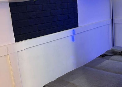 Relaxing massage room at Sparadise Massage Spa LTD, London, England, GB with calming blue lighting.