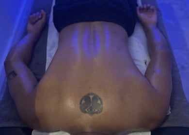 Relaxing massage scene at Sparadise Massage Spa LTD in London, England, GB with calming blue lighting.