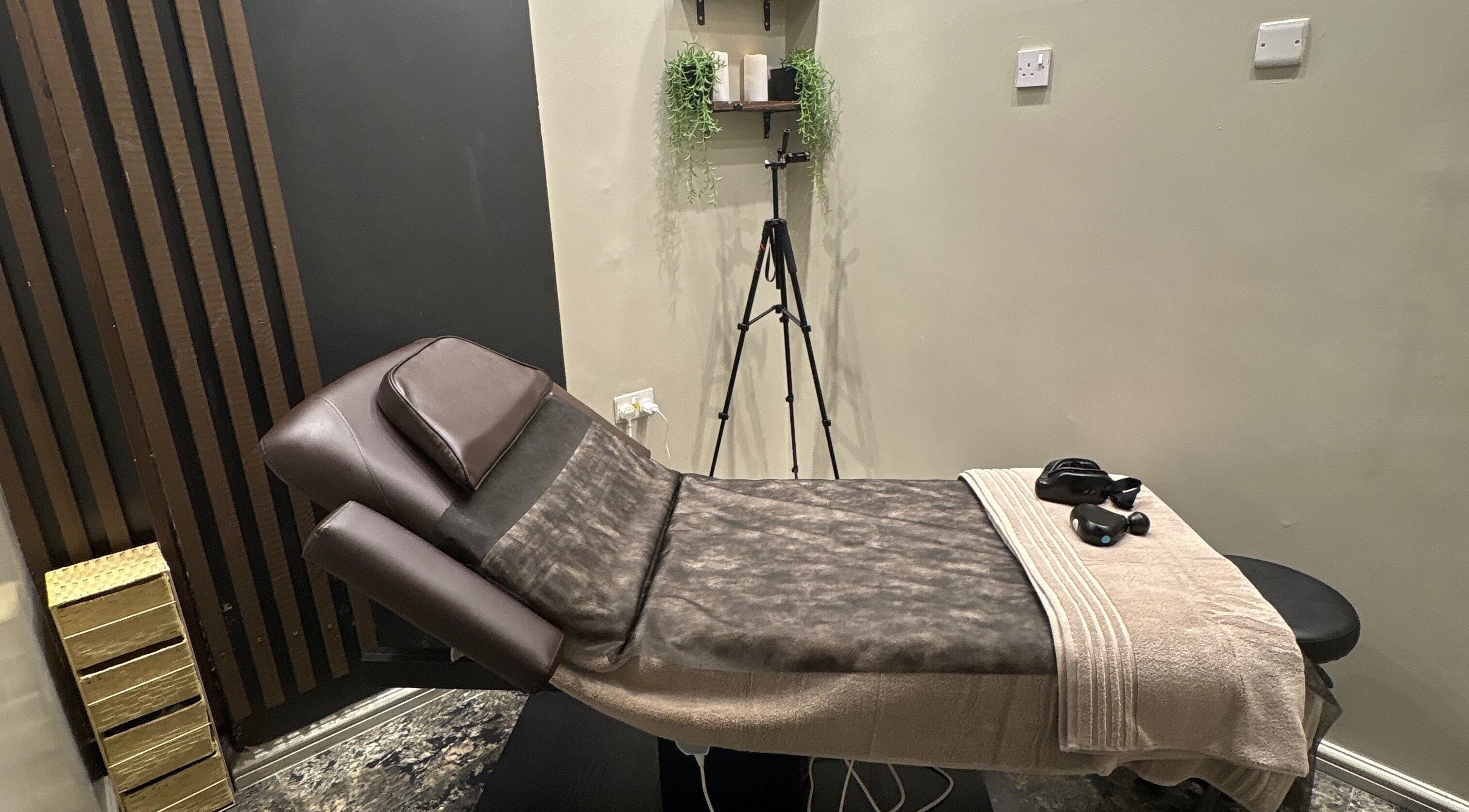 Relaxing massage room at Sparadise Massage Spa LTD, London, England, GB, with a comfortable treatment bed.
