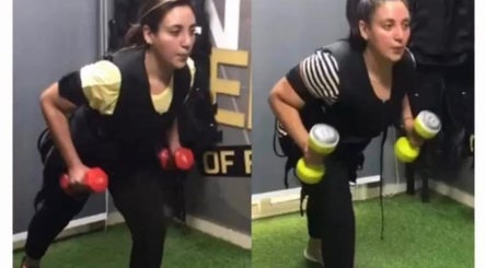 Two women train with dumbbells at Elite Fitness Ems Sheraton Branch, محافظة القاهرة‬, EG.