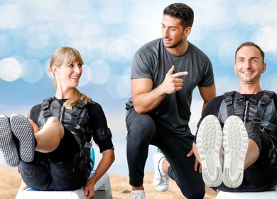 Trainers assisting clients with EMS workouts at Elite Fitness Ems Sheraton Branch, محافظة القاهرة‬, محافظة القاهرة‬, EG.