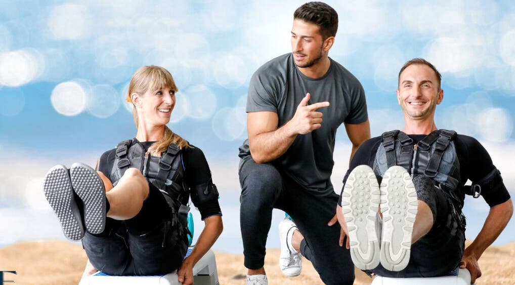 Trainers assisting clients with EMS workouts at Elite Fitness Ems Sheraton Branch, محافظة القاهرة‬, محافظة القاهرة‬, EG.