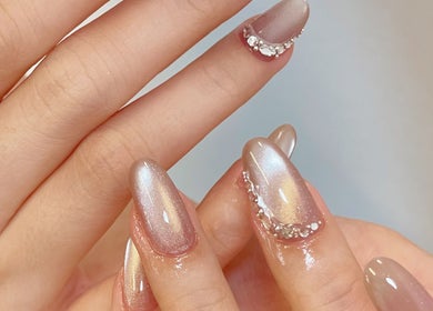 Elegant manicured nails with rhinestones at Soso Beauty, Liverpool, England, GB.