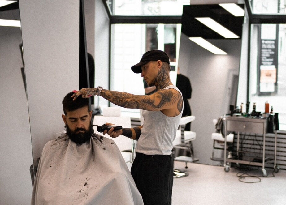 Amiro Barbershop in Zürich, Zürich, CH provides expert barbering services in a sleek, modern interior.