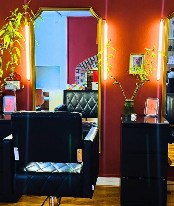 Interior of Studio Rasec – Hair & Beauty in Dublin, with stylish salon chairs and mirrors.