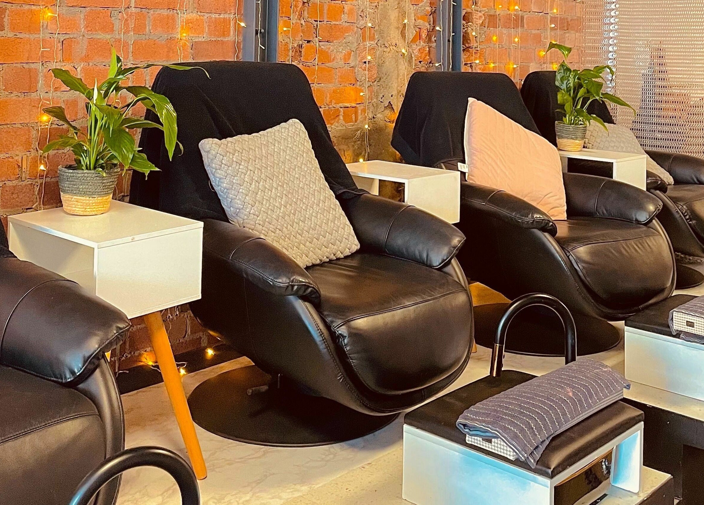 Relaxing massage chairs in cozy Studio V, Lower Hutt, Wellington, NZ, inviting wellness and tranquility.
