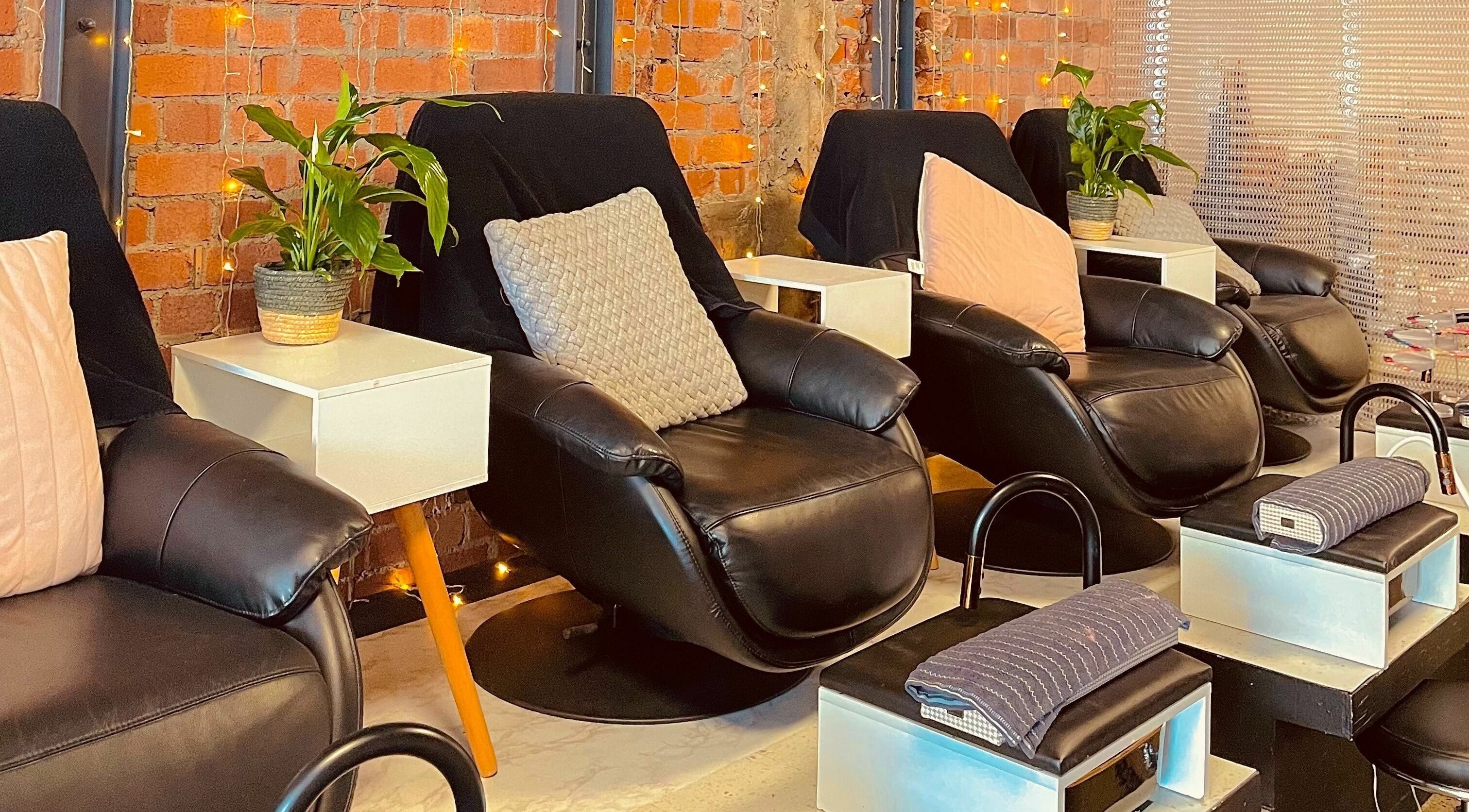 Relaxing massage chairs in cozy Studio V, Lower Hutt, Wellington, NZ, inviting wellness and tranquility.