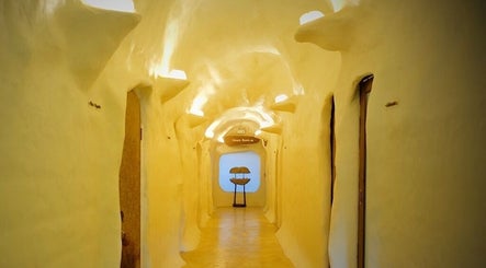 Serene hallway at Srimantra Spa, Chang Wat Chiang Mai, offering a calming retreat ambiance.