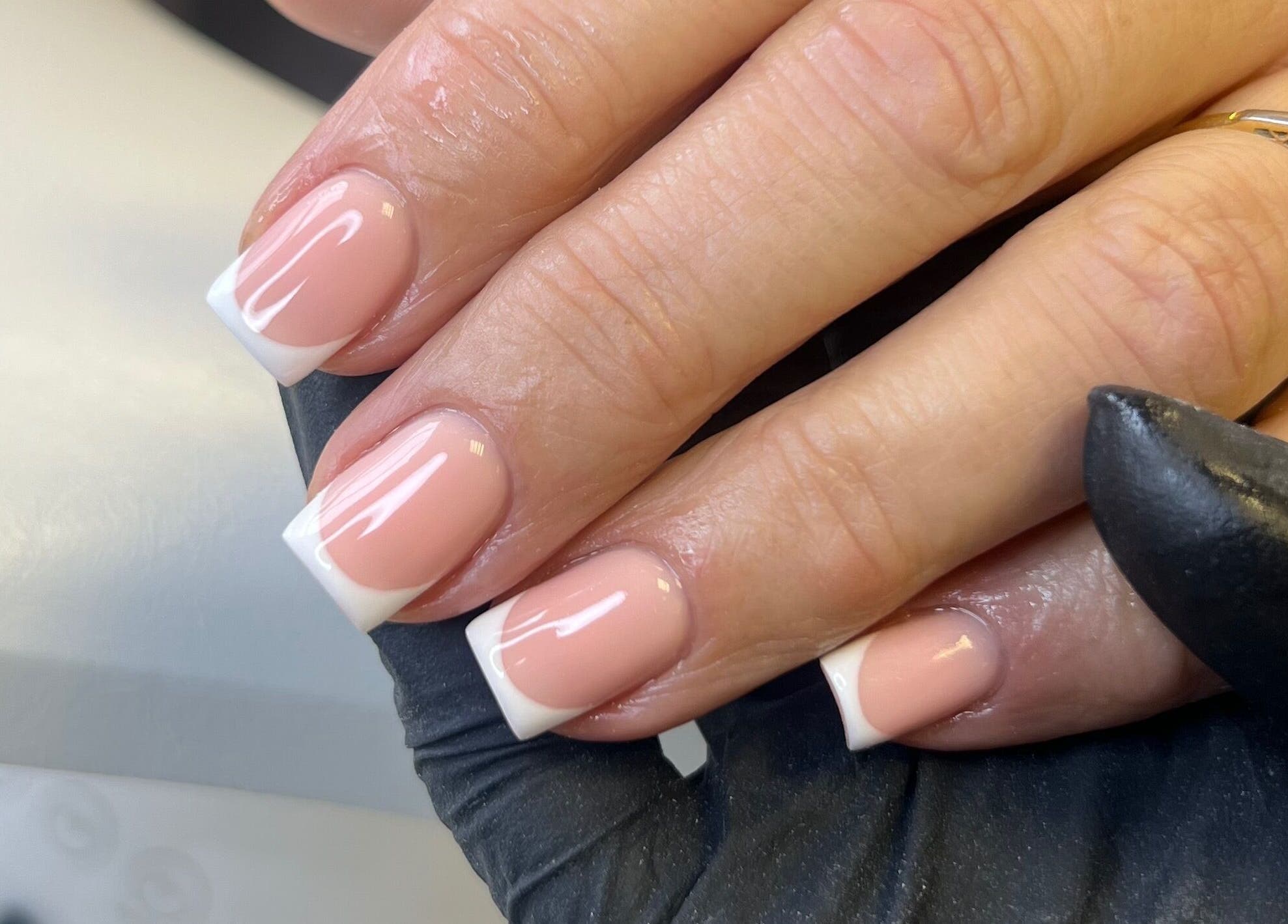 French manicure at SF Laser Studio in Dereham, England, GB showcasing elegant nail design.