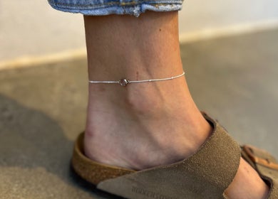 Close-up of a delicate anklet at Indie Bookworm Event, Melbourne, Victoria, AU.