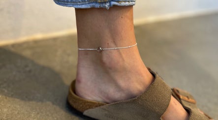 Close-up of a delicate anklet at Indie Bookworm Event, Melbourne, Victoria, AU.