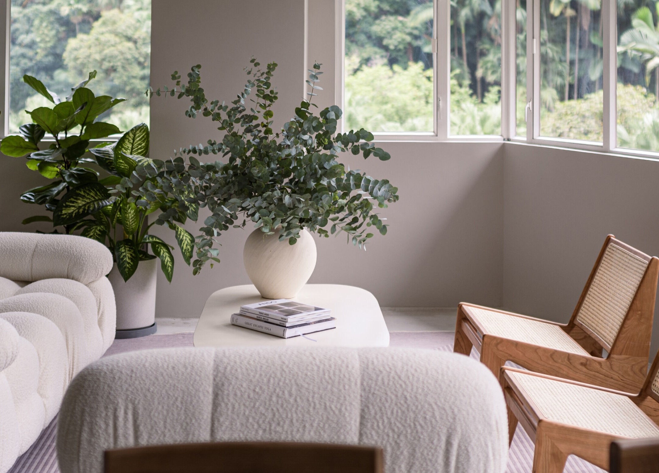 Relaxing lounge at ACME Wellness Hong Kong, nestled in Hong Kong Island with lush greenery view.