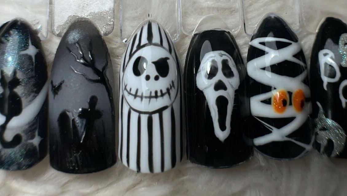Halloween-themed nail art at Nails and Tails, Clevedon, England, GB. Unique designs for a festive look.