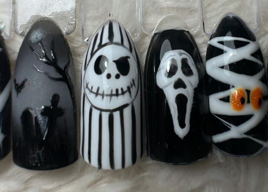 Halloween-themed nail art at Nails and Tails, Clevedon, England, GB. Unique designs for a festive look.