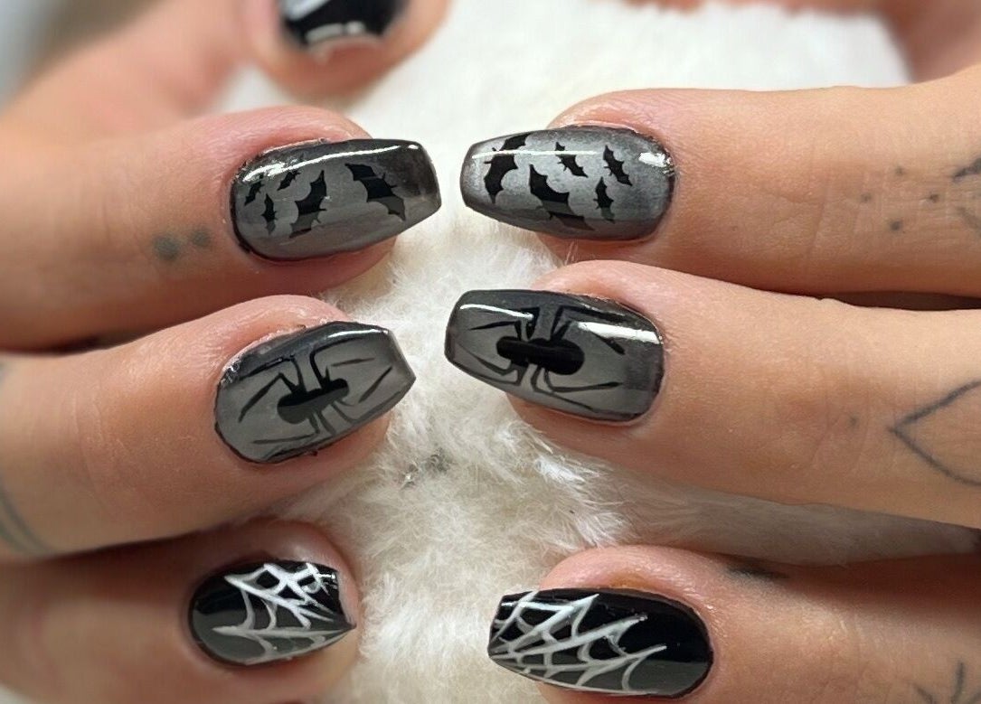 Spooky nail art with bats and spider designs from Nails and Tails in Clevedon, England, GB.