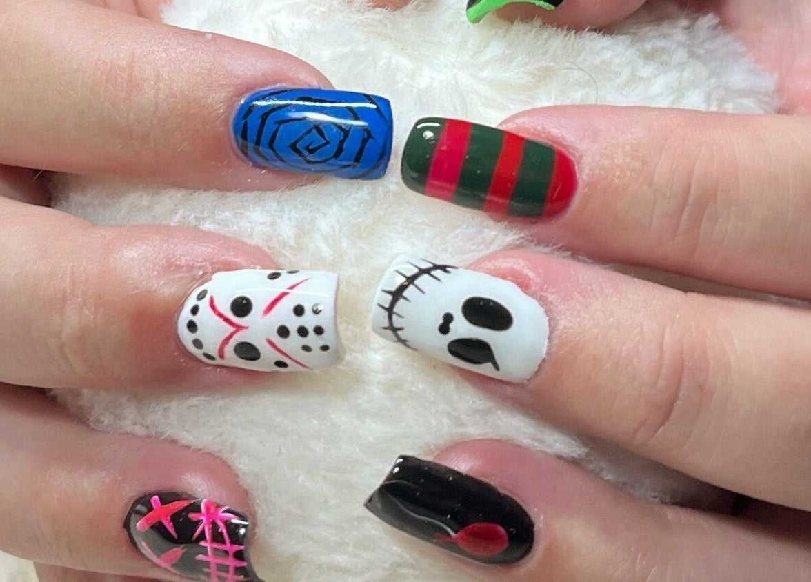 Halloween-themed nail art at Nails and Tails, Clevedon, England, GB. Unique designs for festive flair.