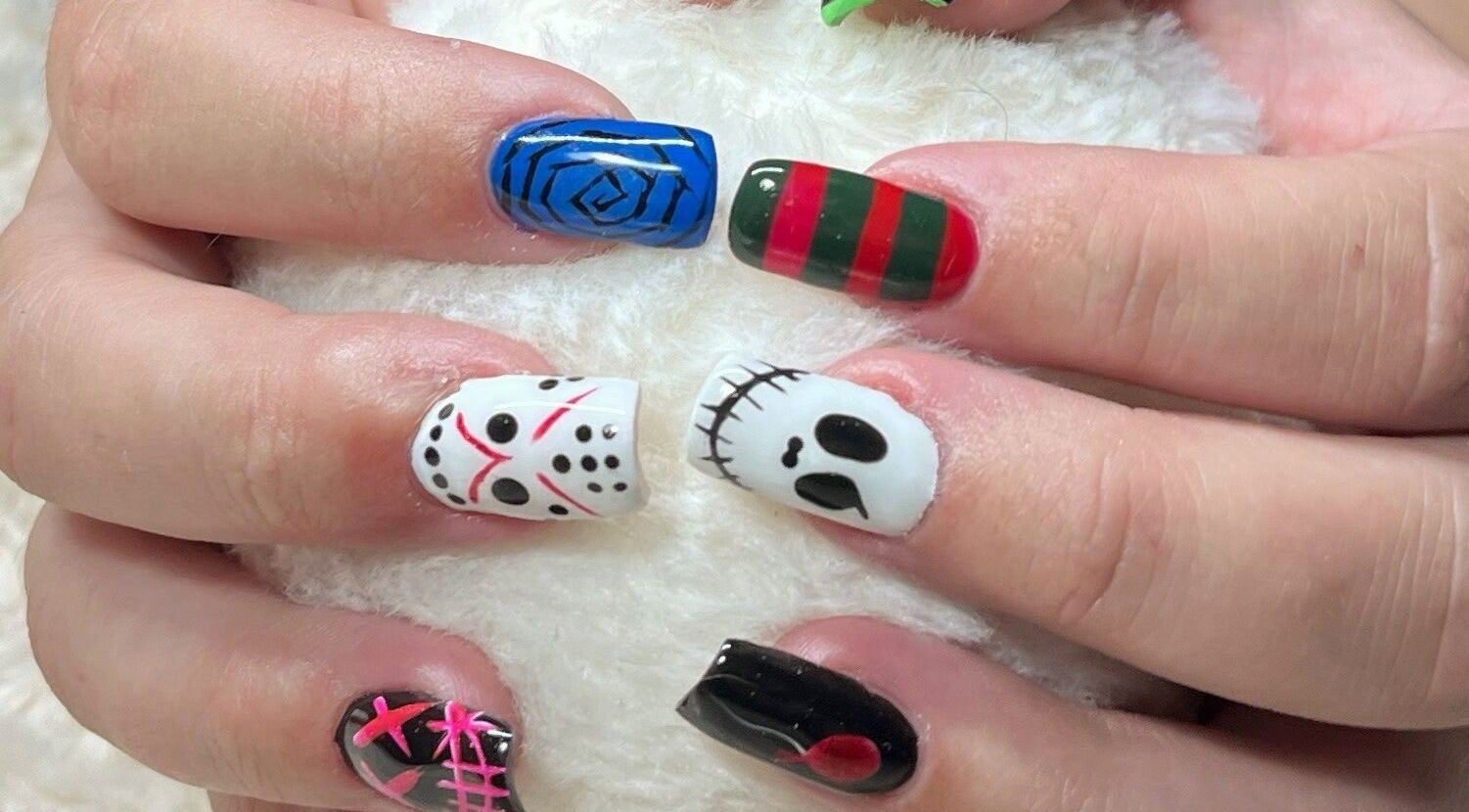 Halloween-themed nail art at Nails and Tails, Clevedon, England, GB. Unique designs for festive flair.