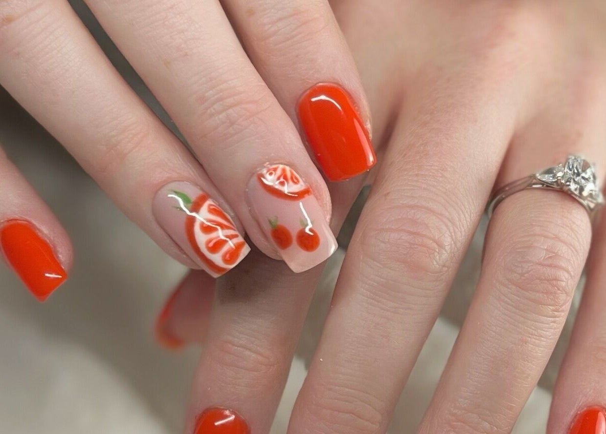 Vibrant citrus nail art at Nails and Tails, Clevedon, England, GB.