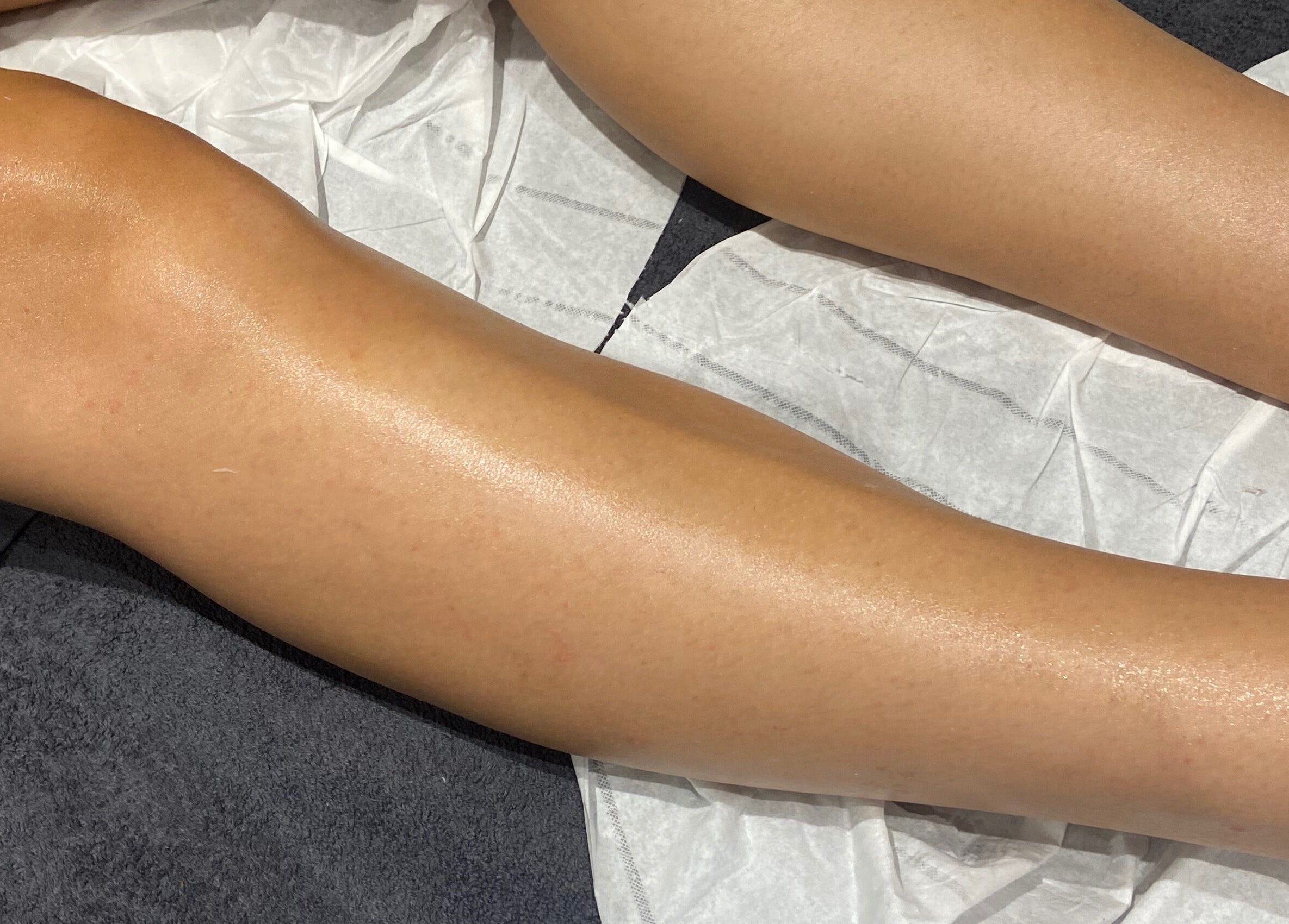 Smooth, waxed legs at Simply Wax, Ballyclare, Northern Ireland, GB offering expert beauty treatments.